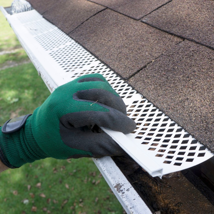 gutter guard along the roof edge