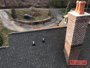 Roof Flashing on Ventilation and Chimney